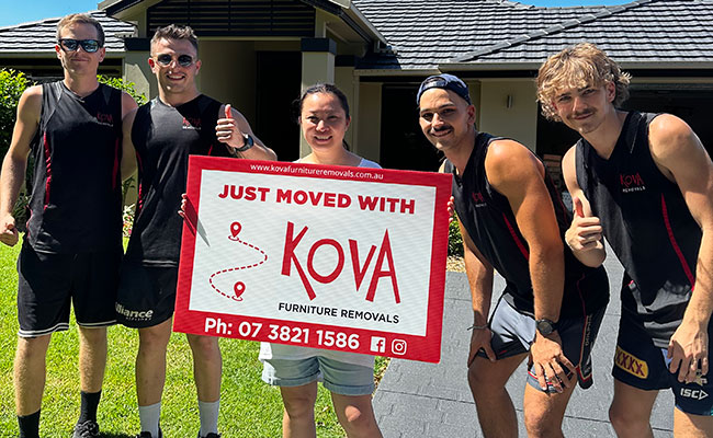 Kova team with just moved sign